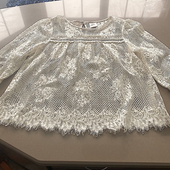 White long sleeve lace blouse with button detail on back. - Picture 1 of 5